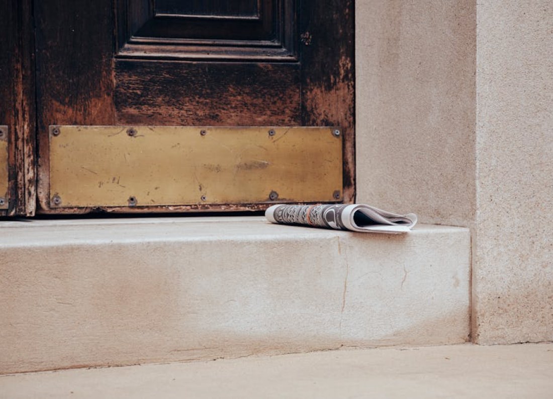 newspaper falling